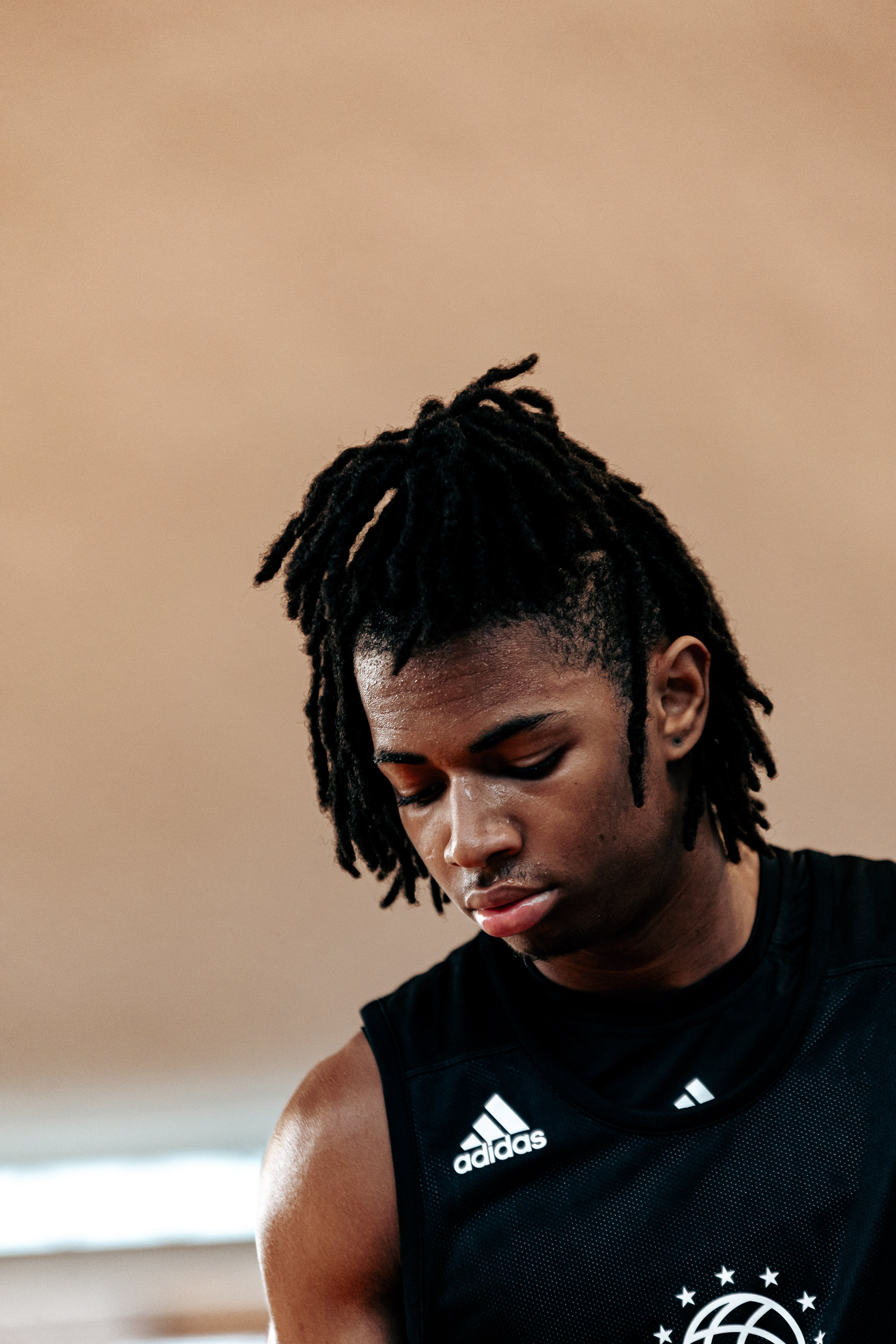 Focused player in black jersey mid-practice