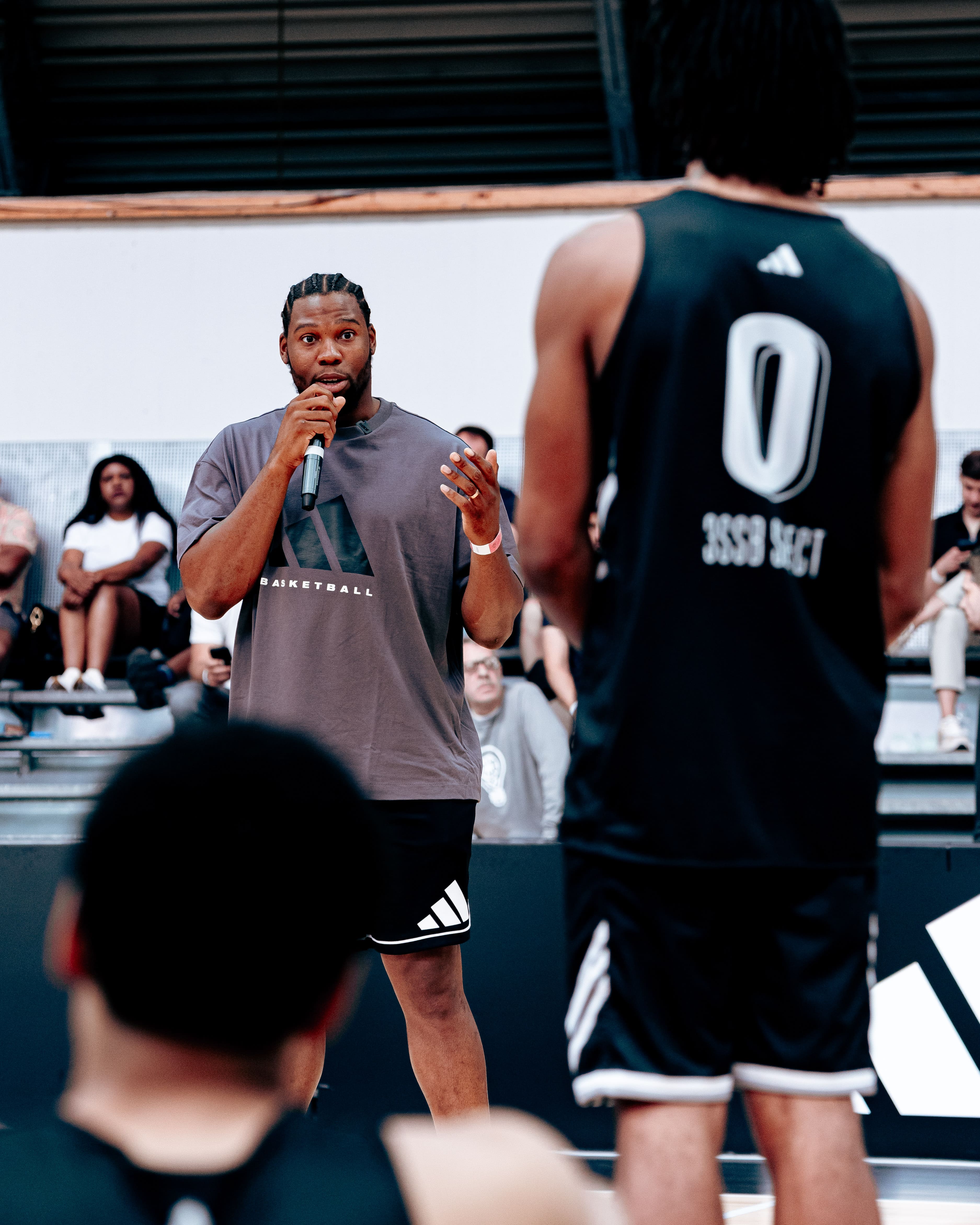 Coach speaking to athletes during a session